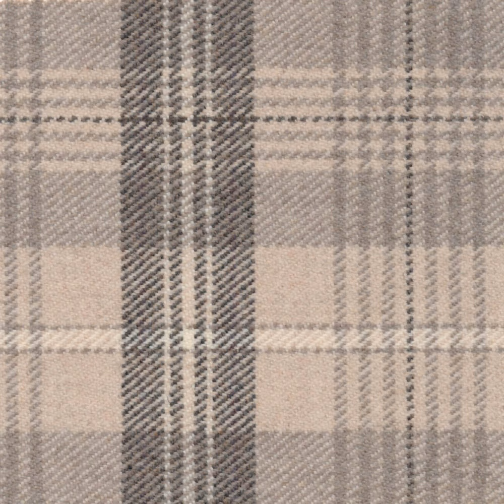 Close-up of pale stone and charcoal plaid with a softly textured woven surface