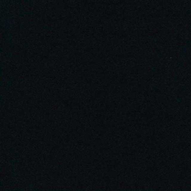 Near-black Crammond Black fabric swatch with a faint, softly textured surface grain