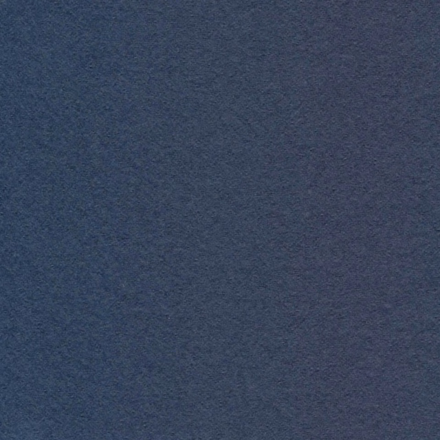 Close-up of Crammond Blue showing a deep blue, subtly mottled textile surface