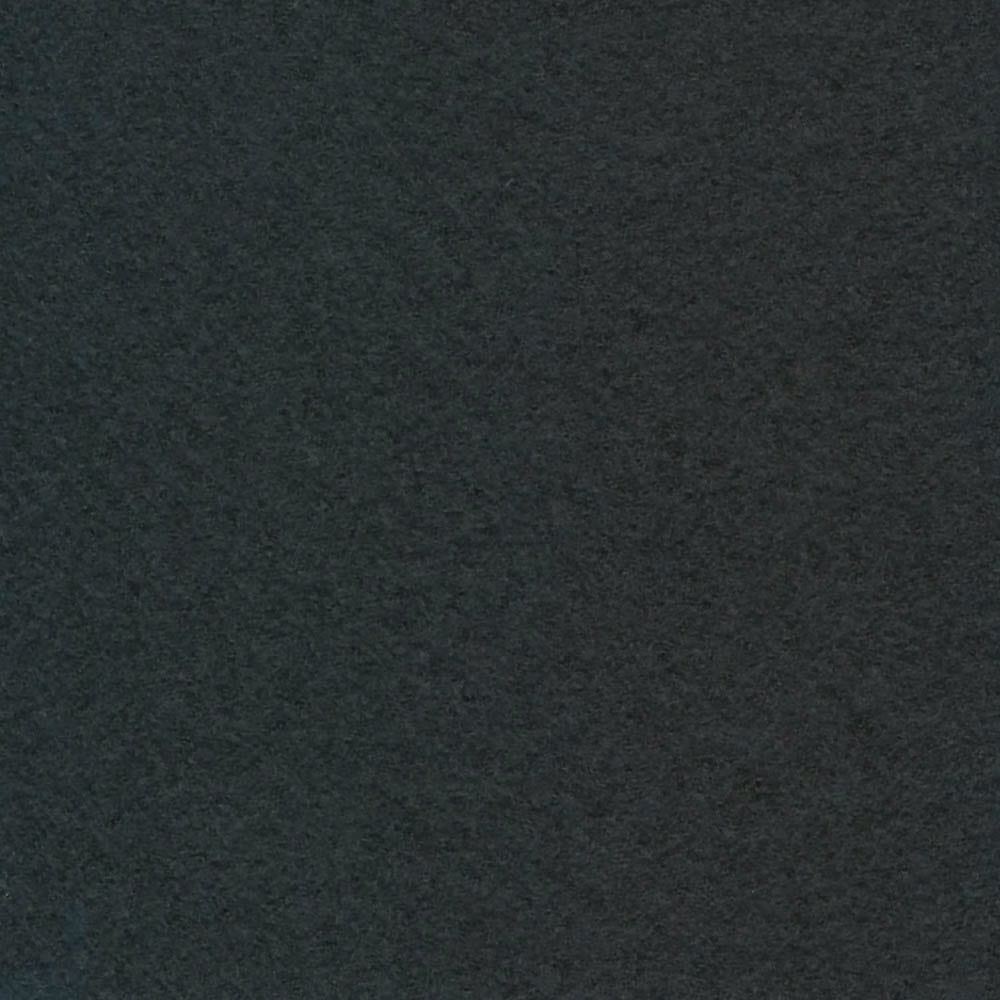 Close-up of a near-black charcoal textile with a soft, mottled surface