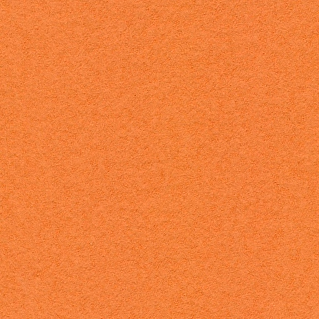 Warm terracotta orange fabric with a fine, softly mottled woven texture