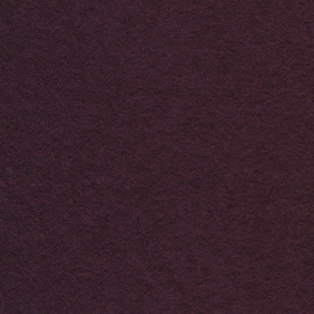 Deep plum fabric with softly mottled, tactile texture and subtle burgundy-purple variation