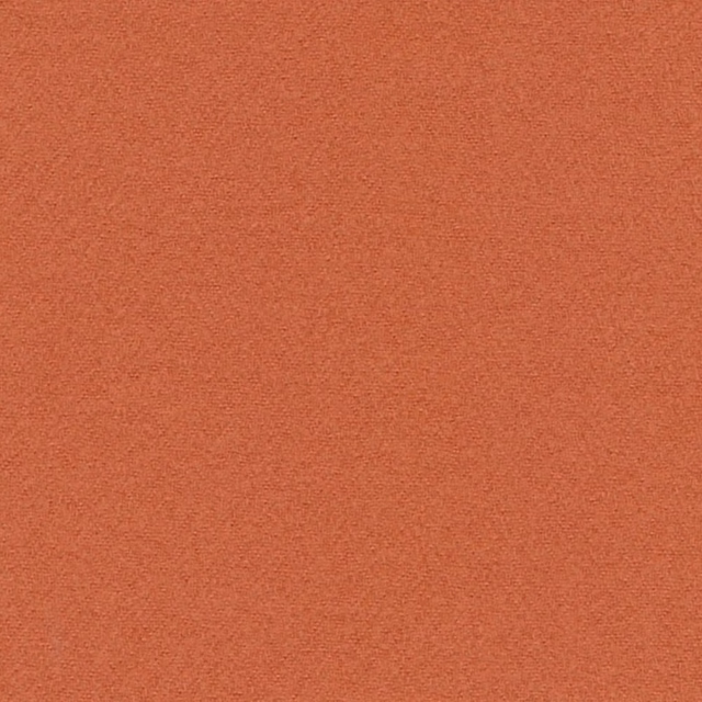 Close-up of plain Crammond Rust fabric in a warm terracotta woven texture
