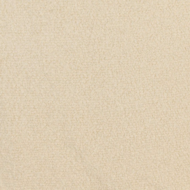 Warm ecru boucle with tiny irregular loops and softly mottled cream texture