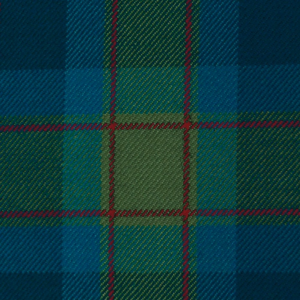 Close-up of deep teal, navy and green tartan with fine burgundy overchecks