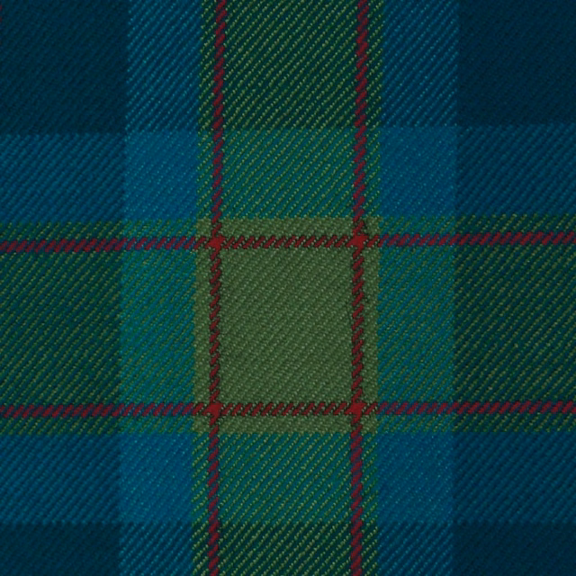 Close-up of deep teal, navy and green tartan with fine burgundy overchecks