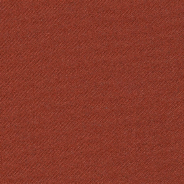 Close-up of dark amber russet fabric with a fine diagonal woven texture