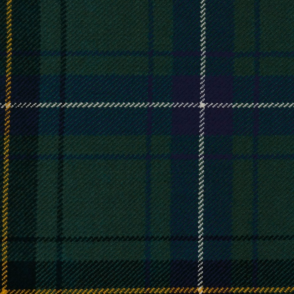 Deep forest green tartan with navy, plum, cream and ochre pinstripes