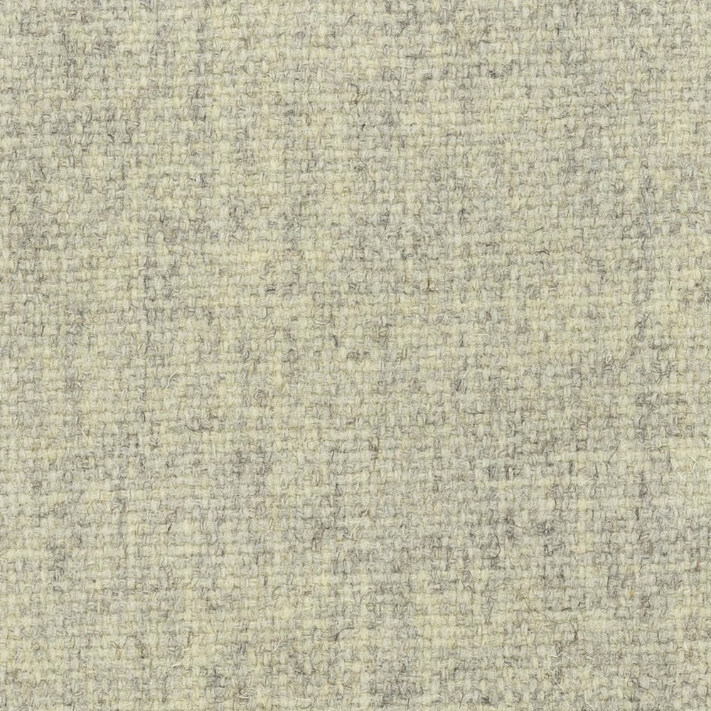 Pale grey-green undyed wool weave with fine mottling and a softly nubby texture