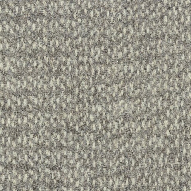Mottled stone-grey woven wool with pale flecks and a dense nubby texture