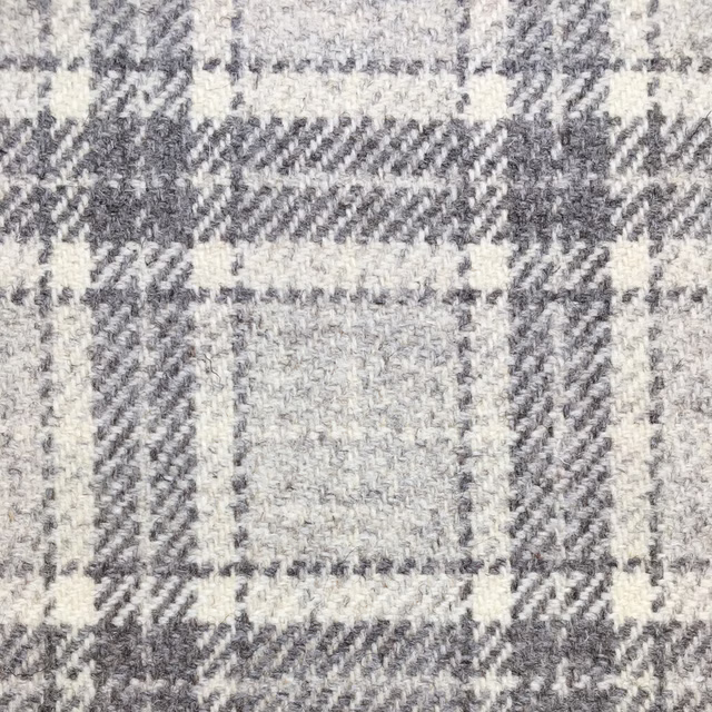 Cool grey and cream plaid with softly flecked, nubby woven texture