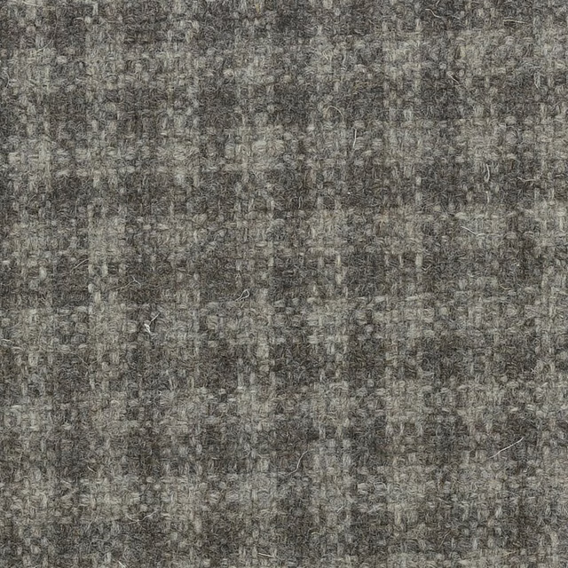 Weathered charcoal-grey undyed wool weave with pale and brown flecks