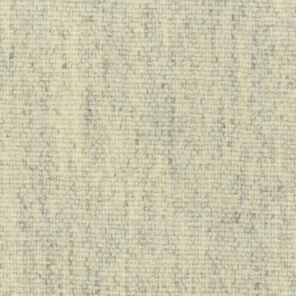 Pale cream woven fabric with fine grey flecks and a softly nubby texture