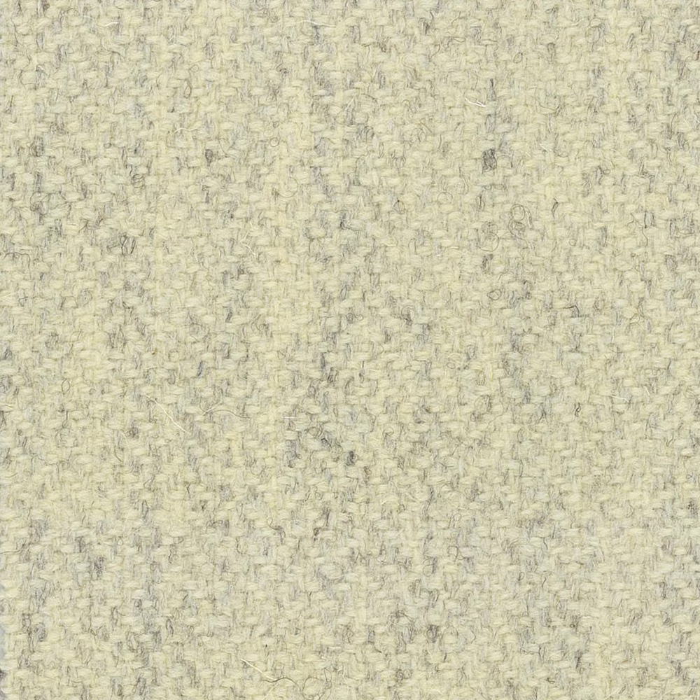 Pale oatmeal cream textile with fine grey flecks and irregular woven texture