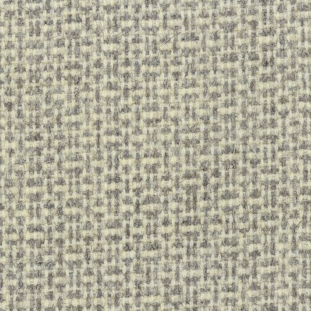 Pale oatmeal-grey wool weave with mottled flecks and small irregular checked texture