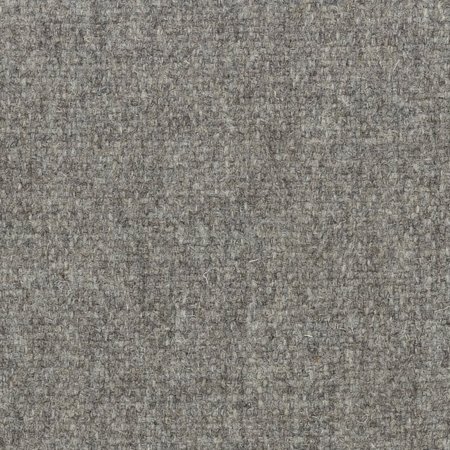 Dense undyed taupe-grey wool weave with irregular brown and grey flecks