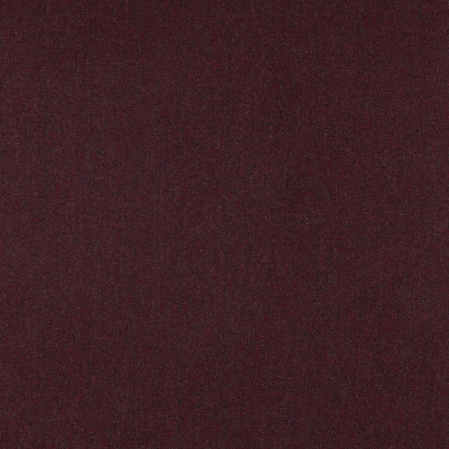 Deep ruby burgundy textile showing a subtle small-scale herringbone weave
