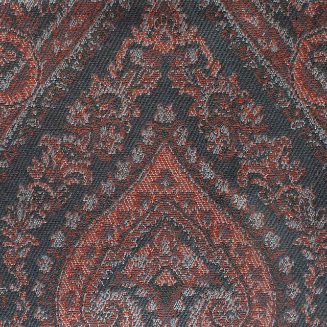 Charcoal woven damask with muted rosehip red scrolls and grey flecked texture