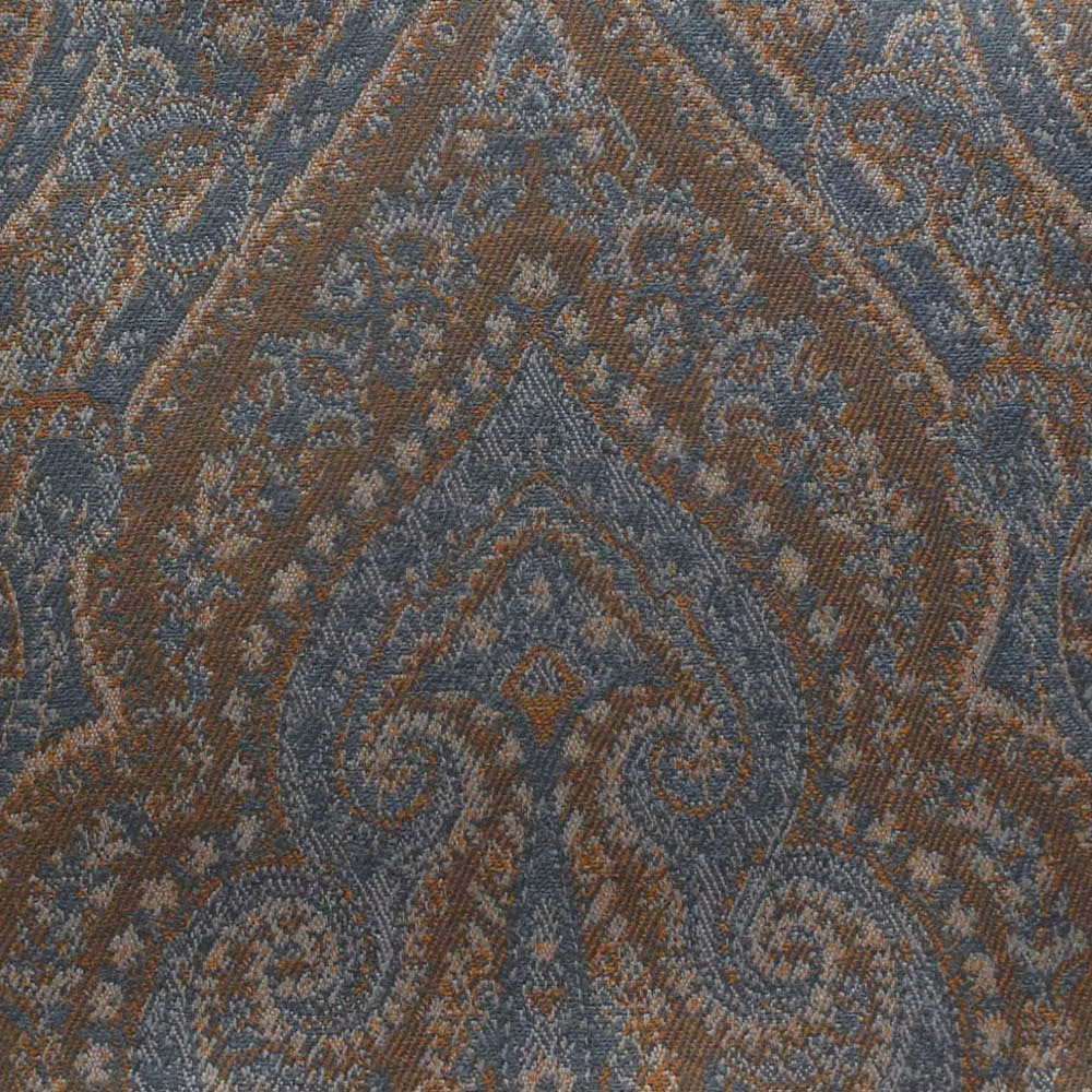 Spice-brown woven textile with blue-grey damask scrolls and angular bands