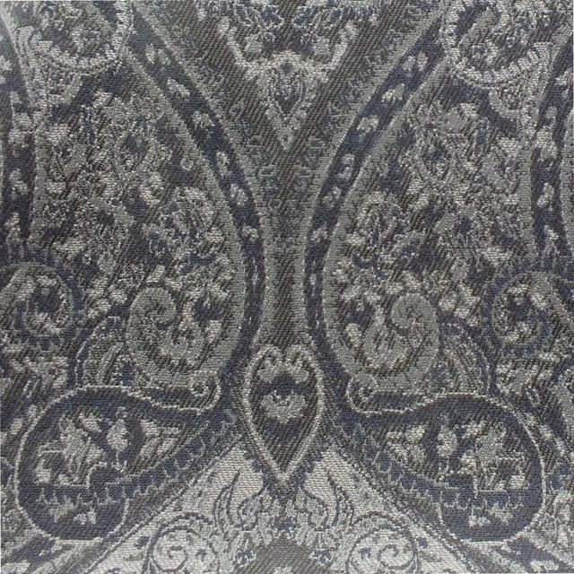 Close view of steel-grey woven damask with curling paisley motifs and textured tonal threads