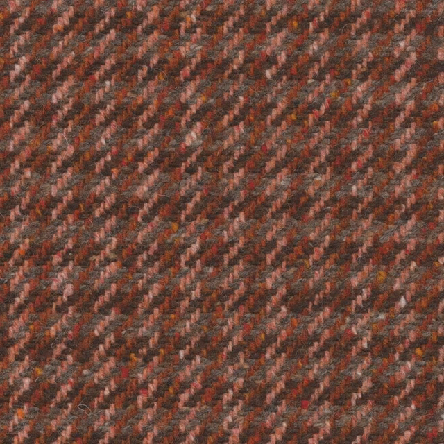 Burnt pimento, charcoal and brown textile with a dense diagonal woven texture