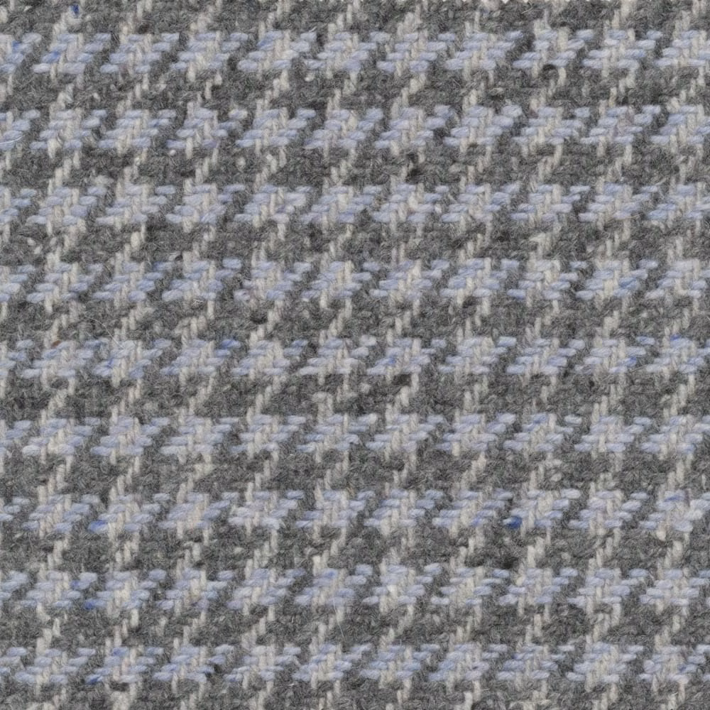 Cool grey woven fabric with pale sky-blue diagonal flecks and nubby texture