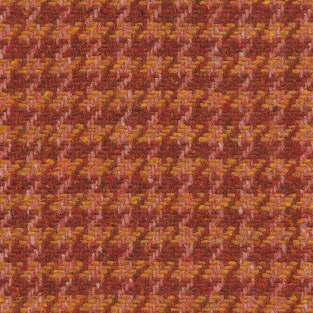 Close-up of burgundy spice weave with mustard flecks and broken diagonal texture