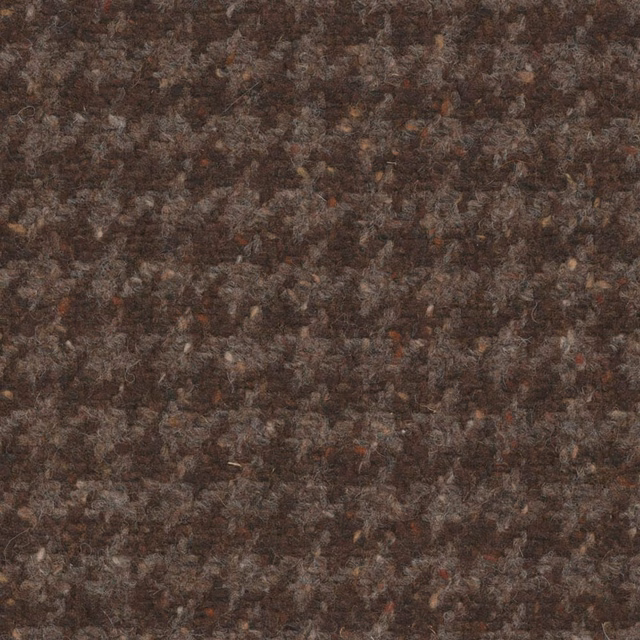 Dark umber textile with charcoal, taupe and muted rust flecks in a dense mottled weave