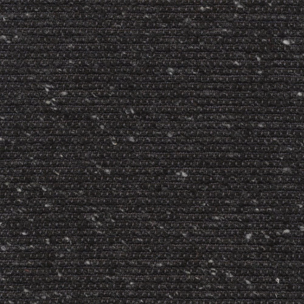 Close-up of dark charcoal woven textile with horizontal ridges and pale flecks