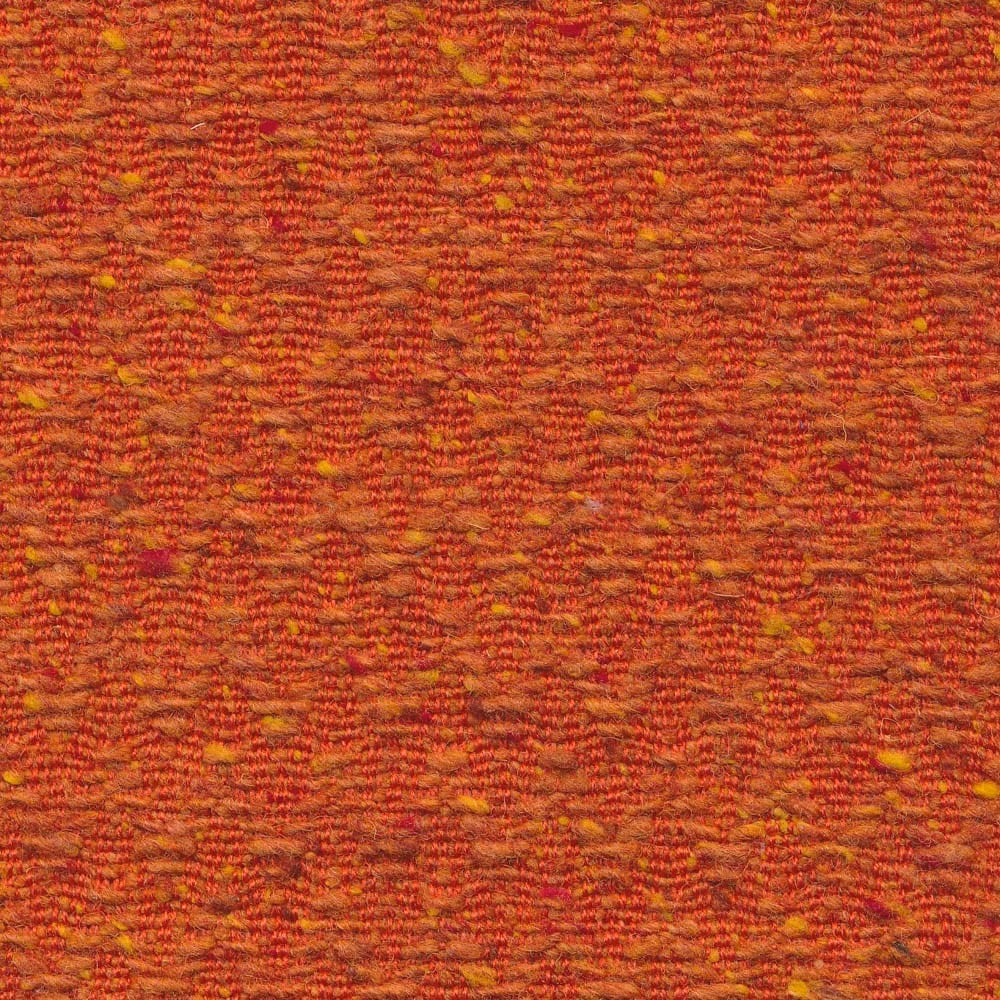 Ember red and rust woven chevron fabric with golden flecks and tactile texture