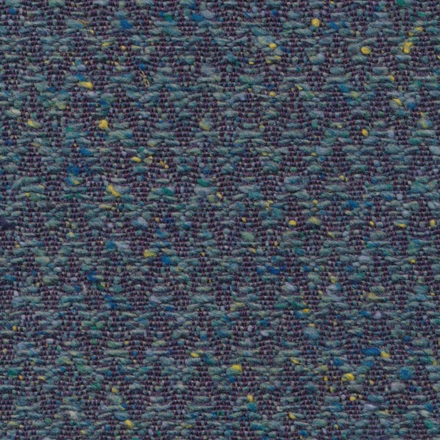 Close-up of dense mottled teal weave with plum, blue and yellow flecks