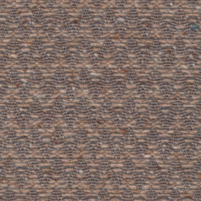 Warm oatmeal taupe woven fabric with subtle chevron texture and brown-grey depth