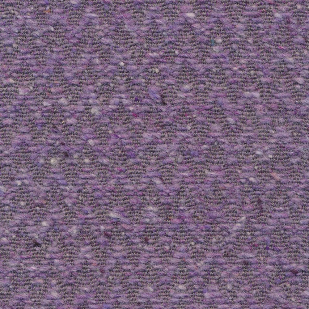 Close-up of muted violet and plum nubby weave forming a soft chevron pattern