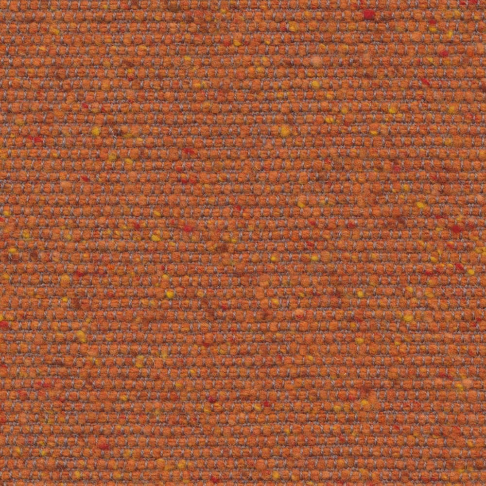 Burnt orange woven upholstery with red, ochre and rust flecks in a nubby texture
