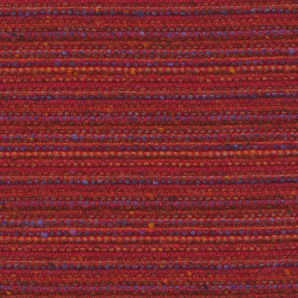 Deep garnet woven textile with blue, purple and ochre horizontal flecks