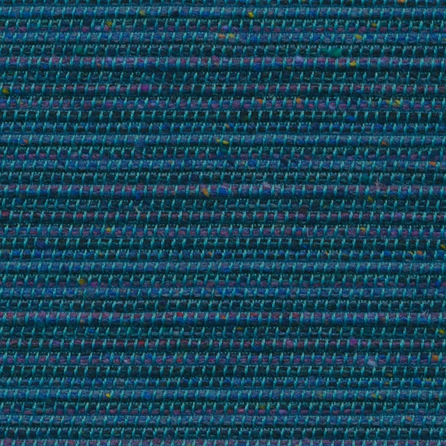Close-up of dense deep teal weave with purple and blue flecks
