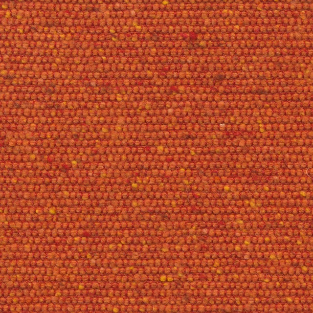 Burnt orange nubby weave with red shading and scattered ochre flecks