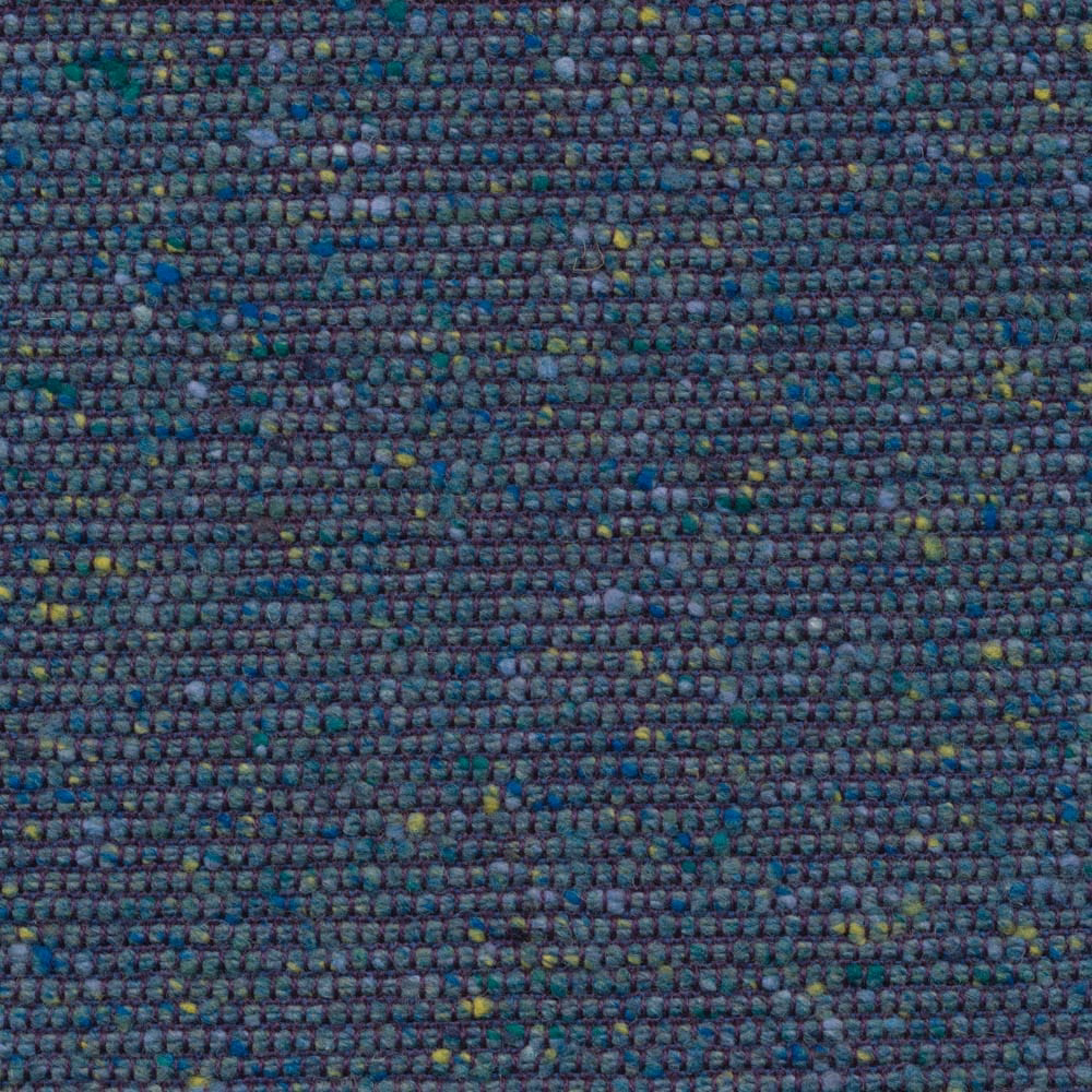 Peacock blue, teal and purple flecked weave with scattered yellow highlights