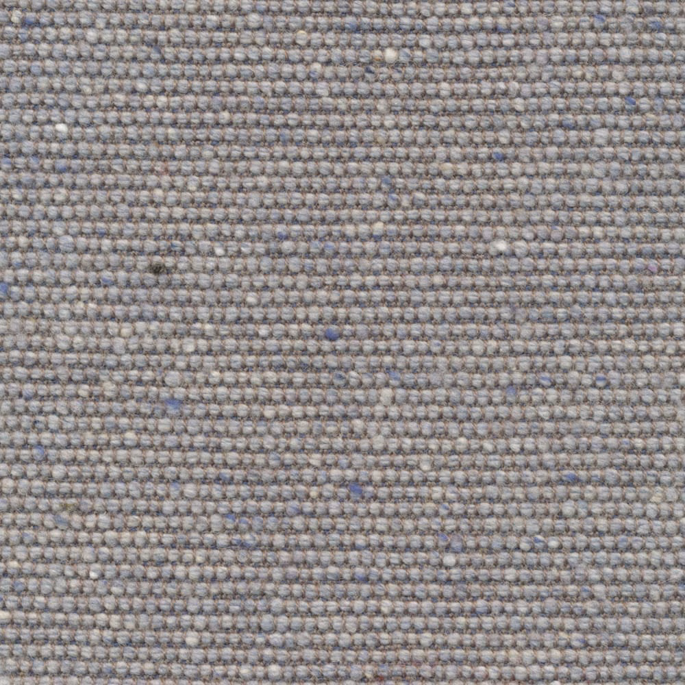 Close-up of cool blue-grey Islabank Sky fabric with nubby flecked woven texture