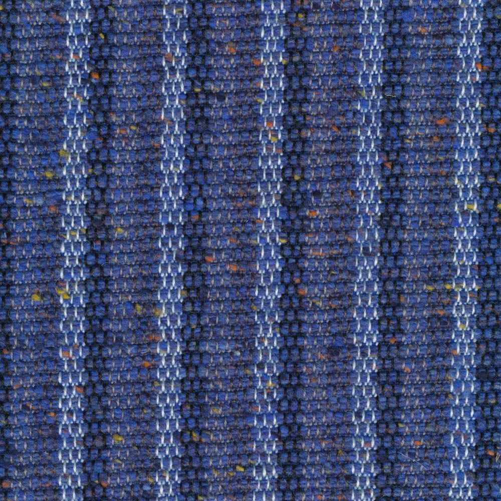 Chunky royal-blue weave with pale vertical stripes and rust-coloured flecks