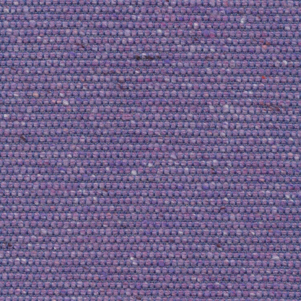 Close-up of Islabank Violet’s nubby weave in layered violet, mauve and blue-purple