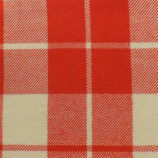 Warm red and cream checked fabric with fine diagonal woven texture