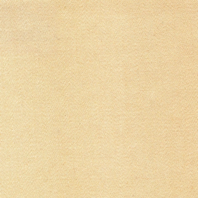 Warm champagne sateen fabric with a fine, closely woven surface