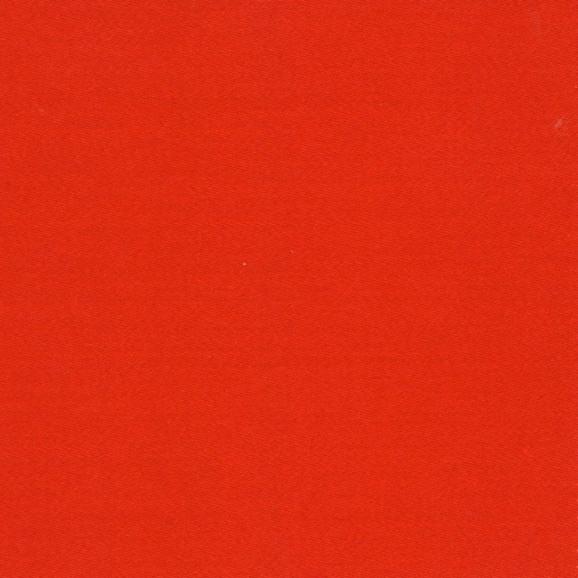 Close-up of vivid fire-red sateen with a fine diagonal woven texture