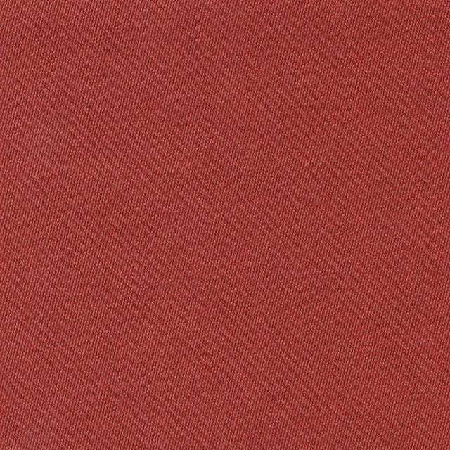 Close-up of muted tulip-red sateen fabric with fine vertical woven texture