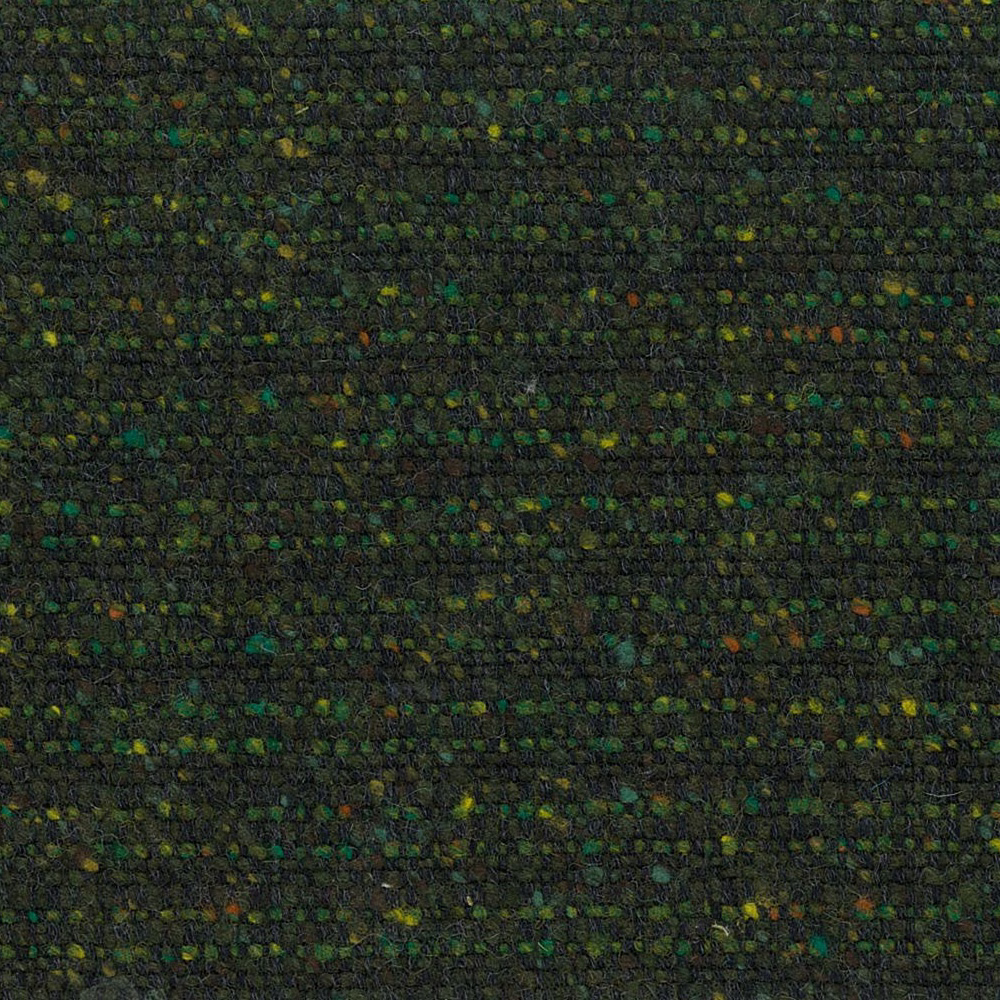 Dense woodland-green nubby weave with charcoal ground and scattered olive, teal, mustard and rust flecks