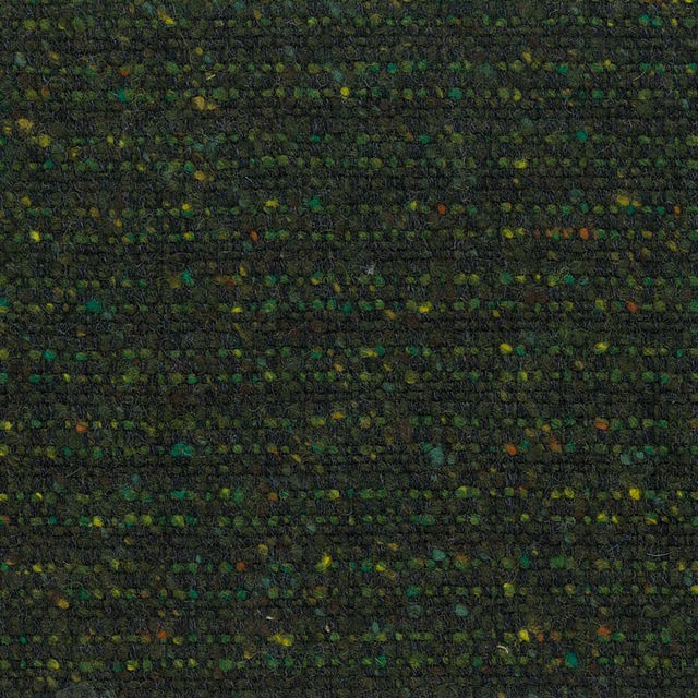 Dense woodland-green nubby weave with charcoal ground and scattered olive, teal, mustard and rust flecks