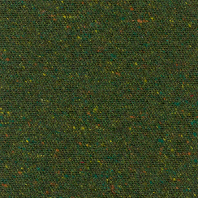 Deep evergreen nubby weave with scattered olive, teal, ochre and rust flecks
