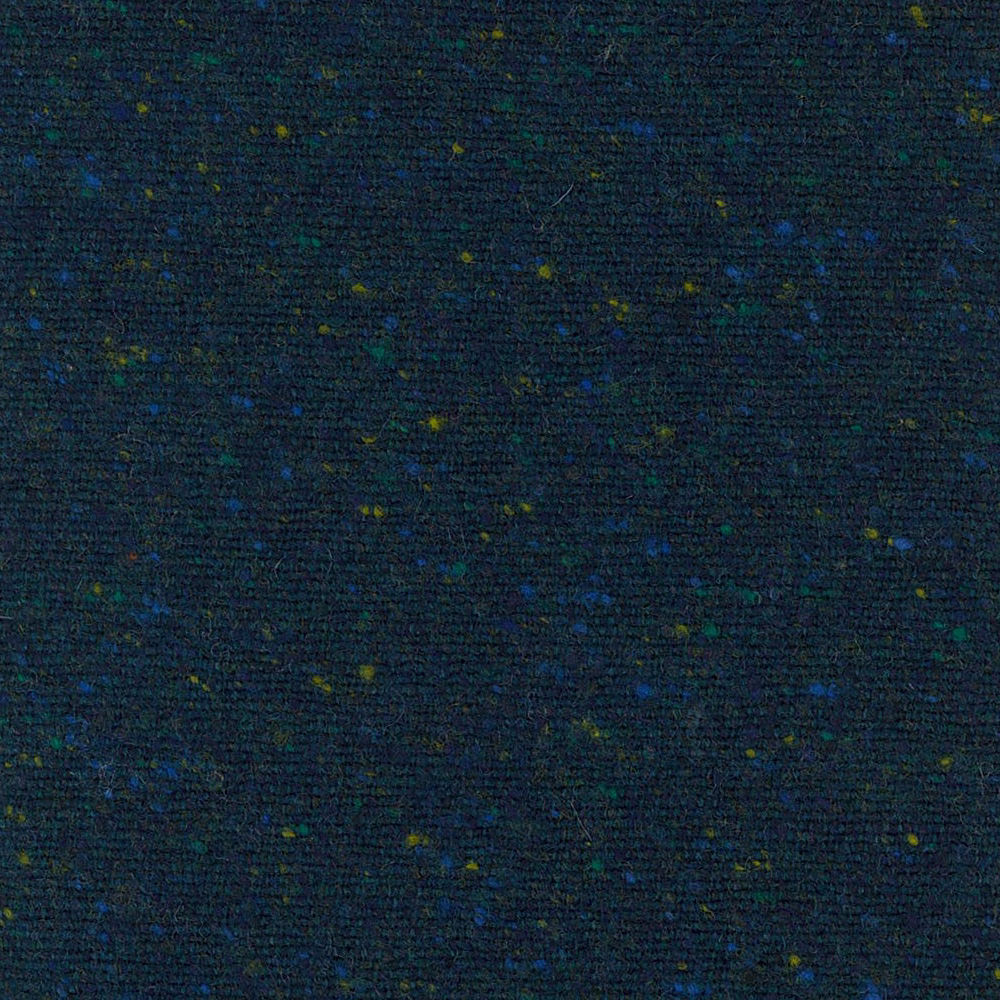 Near-black woven fabric with scattered kingfisher-blue, teal, green and mustard flecks