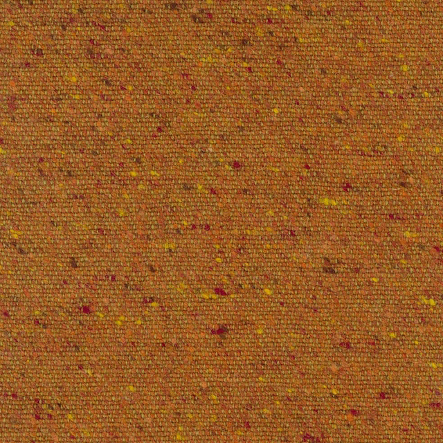 Burnt ochre woven ground with tiny crimson and yellow flecks